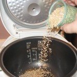 pouring-steel-cut-oats-into-the-rice-cooker