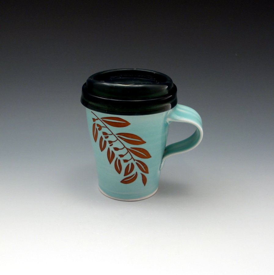 Aquamarine glazed porcelain travel mug with branch pattern
